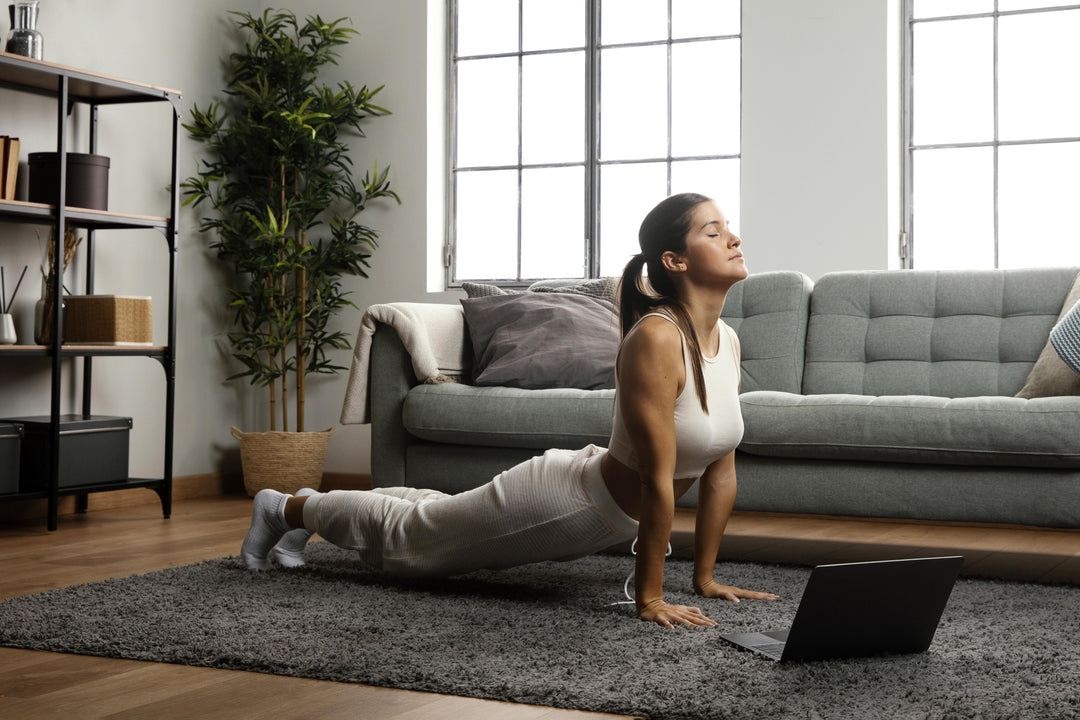 long-shot-woman-practicing-yoga (1)