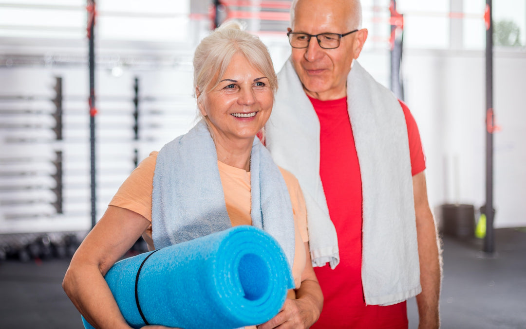 Senior couple ine the fitness club